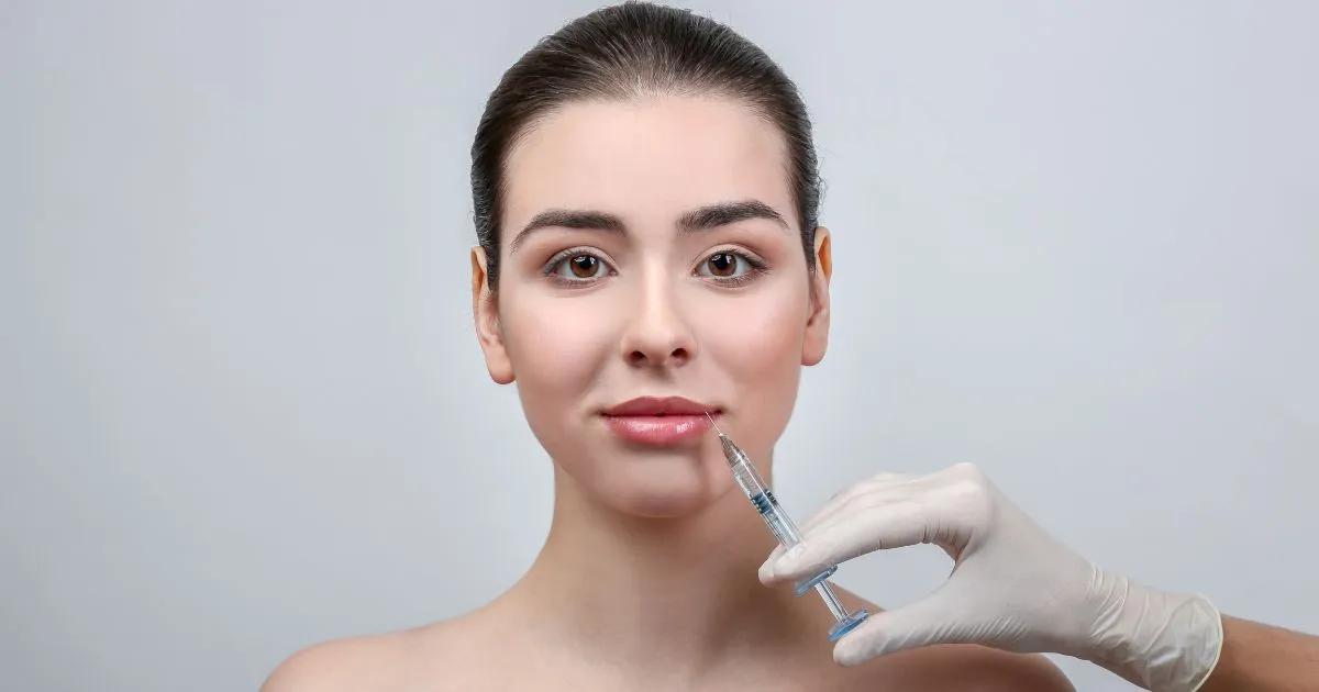 Woman receiving Lip plumping with Juvederm injection in Liberty Hill TX